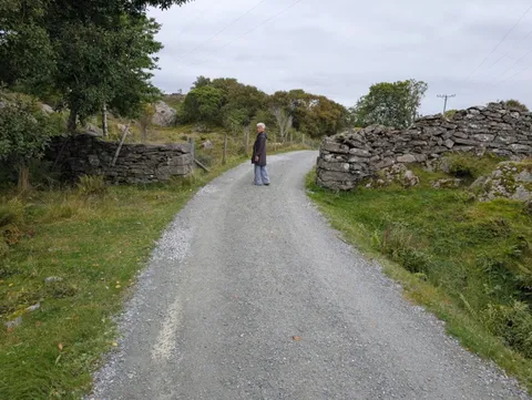 The gravel path to Ryvarden lighthouse, lined with old dry-stone walls